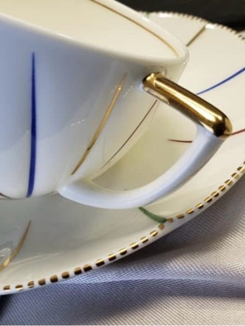 Set of five Lanvin White Porcelain Cup and Saucer with Multicolor Swirl Accent